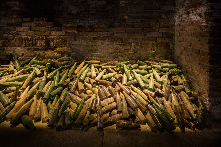 Selasi Awusi Sosu, <i>Glass Factory II</i>, 2019, three-channel color and black and white video installation with glass bottles, stereo sound, 7'08", 5'33", 10'10", Courtesy: Selasi Awusi Sosu, Photo: David Lavene