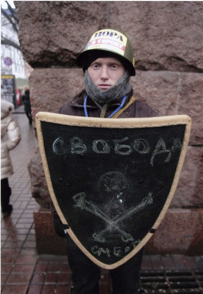 Boris Mikhailov, from the series <i>The Theater of the Military Acting</i>, December 2013, Kyiv, Maidan, Courtesy: Boris Mikhailov and Galerie Barbara Weiss, Berlin