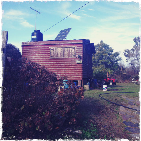 Traditional house with solar system, Isla Paulina, Argentina, Photo: Critical Art Ensemble